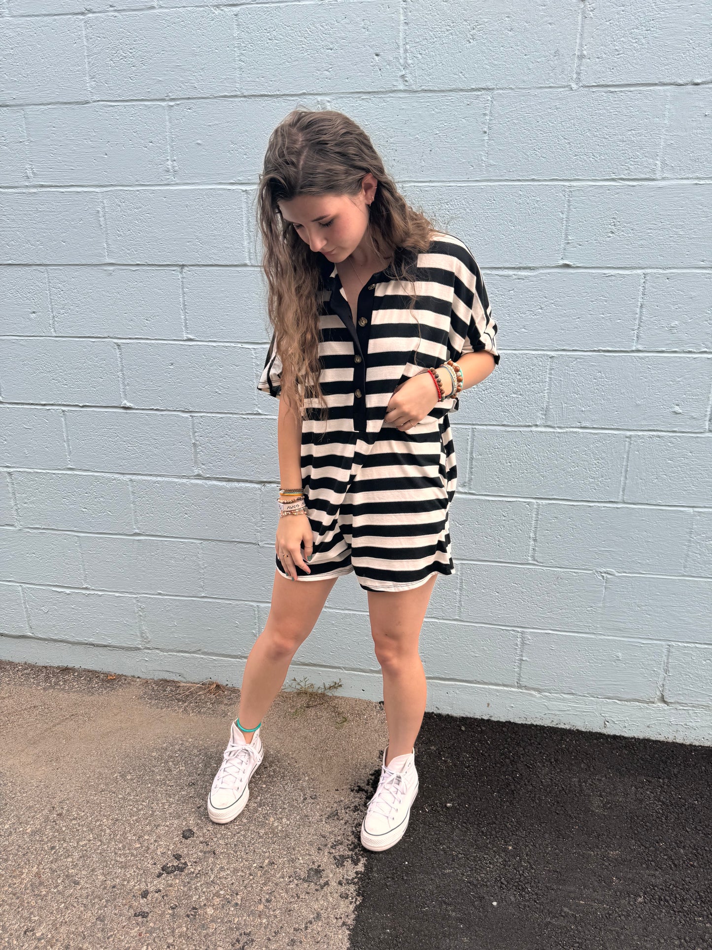 romping around striped romper